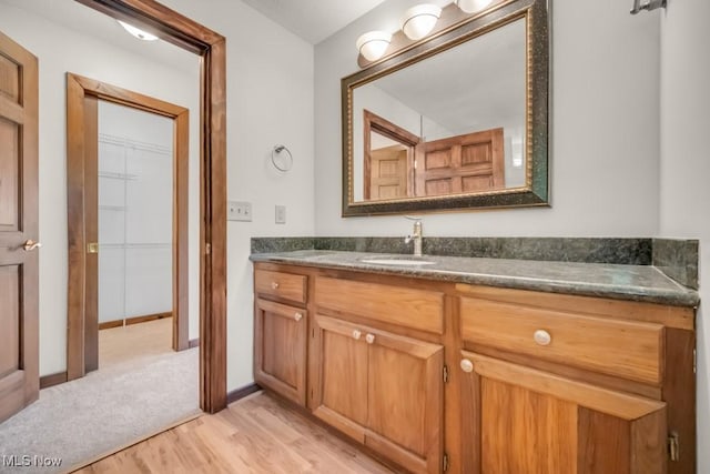 38038 Ridge Rd, Willoughby, OH 44094 - bathroom featuring wood finished floors and vanity