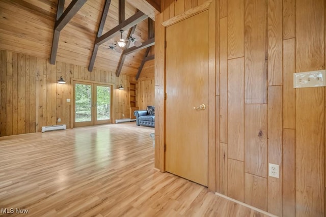 38038 Ridge Rd, Willoughby, OH 44094 - unfurnished living room featuring a baseboard radiator, wooden ceiling, french doors, wood finished floors, and wooden walls