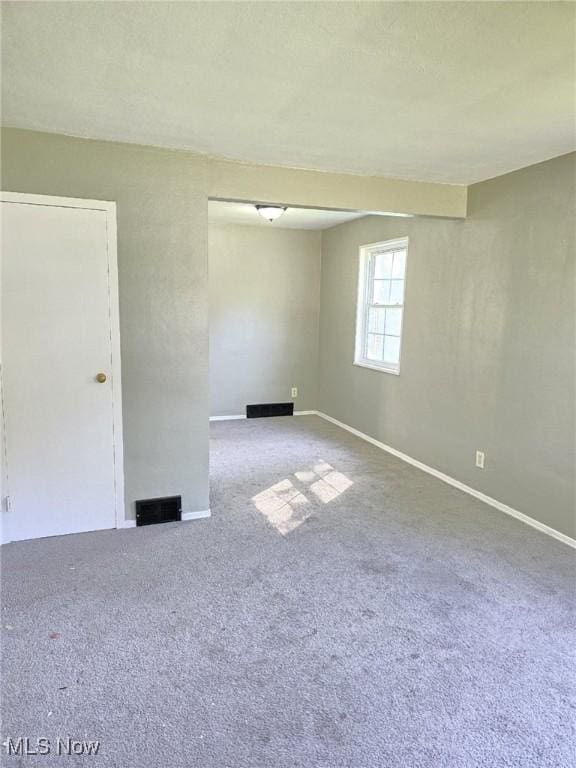 481 Kenwood Dr Unit N, Euclid, OH 44123 - empty room featuring carpet flooring and baseboards