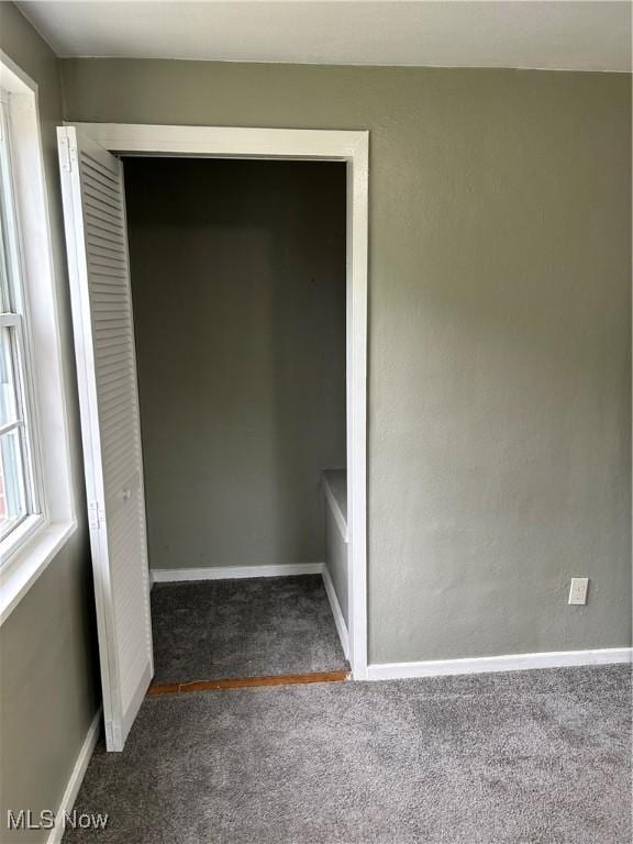 481 Kenwood Dr Unit N, Euclid, OH 44123 - unfurnished bedroom with carpet and a closet