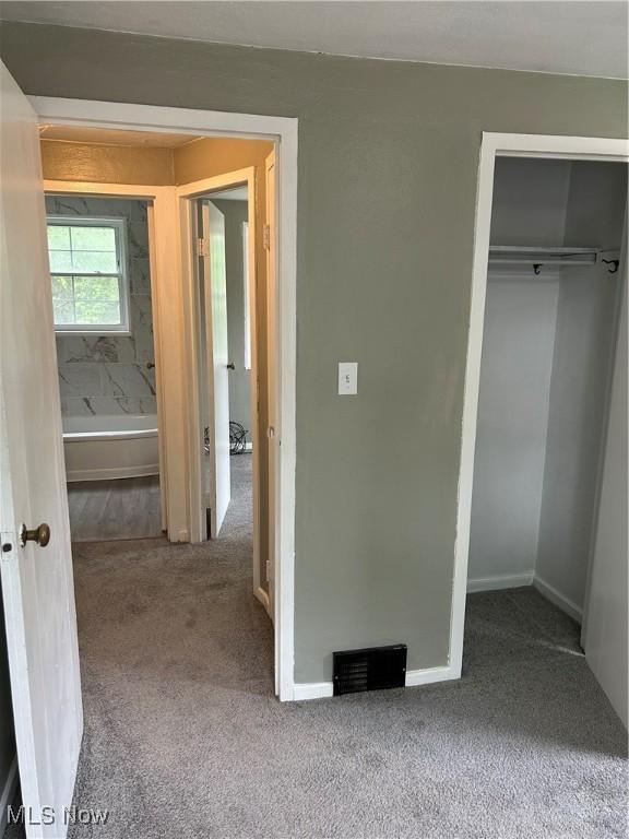 481 Kenwood Dr Unit N, Euclid, OH 44123 - unfurnished bedroom featuring carpet floors and a closet
