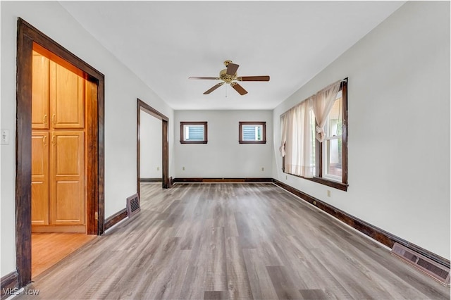 1716 Ardoyne Ave, Cleveland, OH 44109 - spare room featuring light wood-style flooring and a ceiling fan