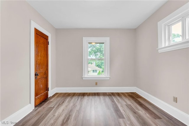 1716 Ardoyne Ave, Cleveland, OH 44109 - unfurnished room featuring wood finished floors and baseboards
