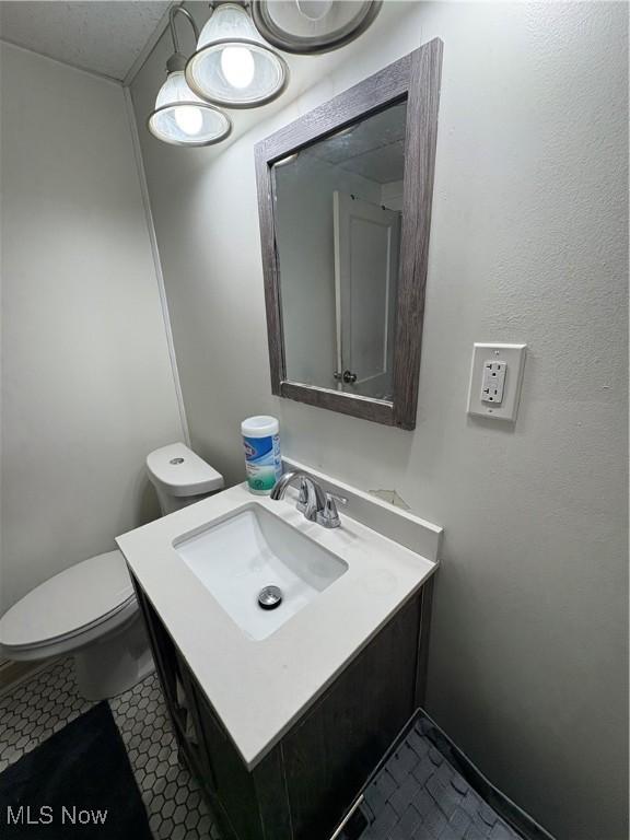 12627 Iowa Ave, Cleveland, OH 44108 - half bath with vanity and tile patterned flooring