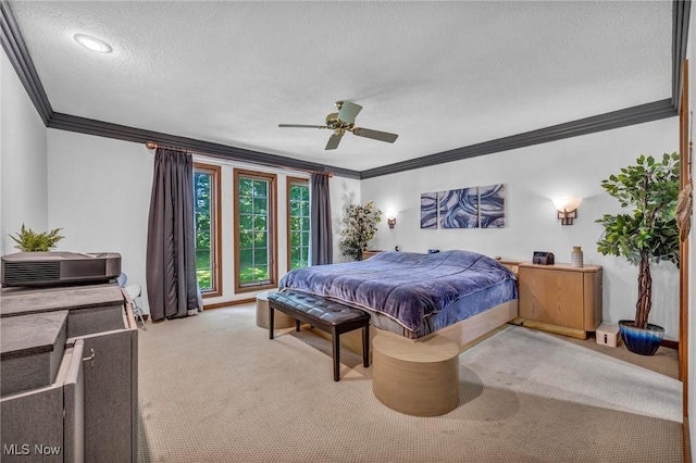 6869 Cliffside Dr, Vermilion, OH 44089 - bedroom featuring ornamental molding, a textured ceiling, carpet, and ceiling fan