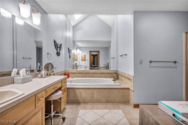 6869 Cliffside Dr, Vermilion, OH 44089 - bathroom with tile patterned flooring, a garden tub, and vanity