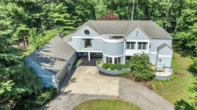 6869 Cliffside Dr, Vermilion, OH 44089 - view of front of house with stucco siding and roof with shingles