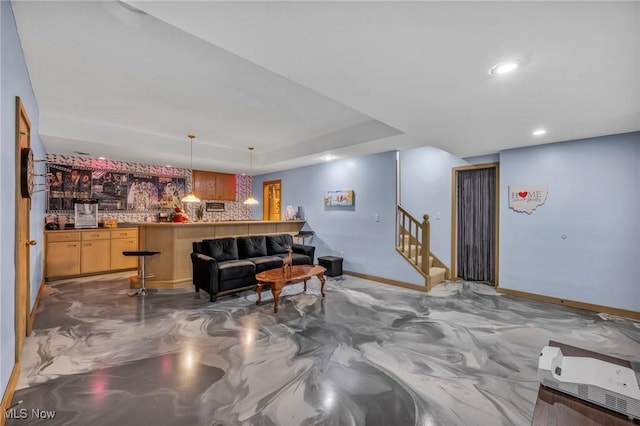 6869 Cliffside Dr, Vermilion, OH 44089 - living area with bar, stairs, and recessed lighting