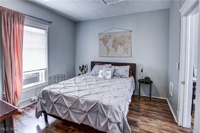 1289 W 115th St, Cleveland, OH 44102 - bedroom featuring wood finished floors and multiple windows
