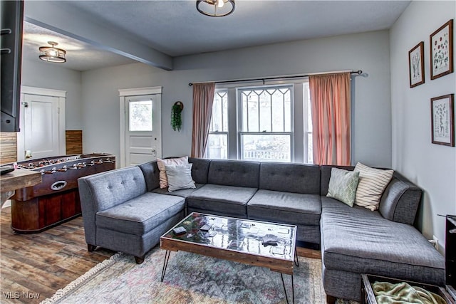 1289 W 115th St, Cleveland, OH 44102 - living area with wood finished floors and beam ceiling