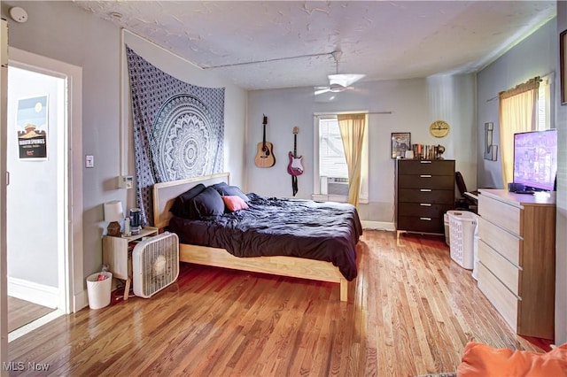 1289 W 115th St, Cleveland, OH 44102 - bedroom featuring light wood-type flooring and a ceiling fan