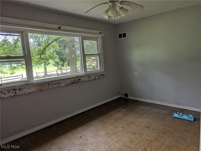 4562 Erie Ave NW, Canal Fulton, OH 44614 - empty room featuring ceiling fan and baseboards