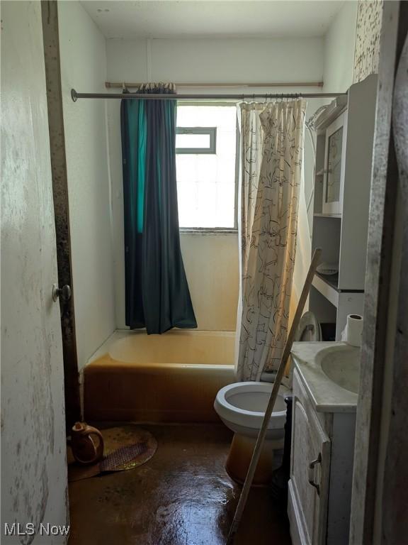 4562 Erie Ave NW, Canal Fulton, OH 44614 - bathroom featuring vanity, shower / tub combo, and unfinished concrete flooring