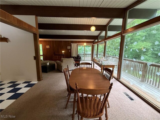 126 Stony Creek Dr, Millersburg, OH 44654 - dining space with wooden walls and tile patterned floors
