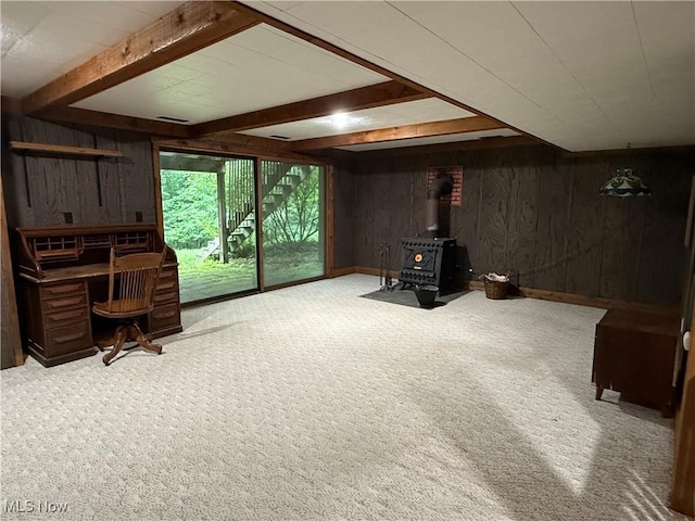 126 Stony Creek Dr, Millersburg, OH 44654 - basement with wooden walls, carpet, a wood stove, and an office area