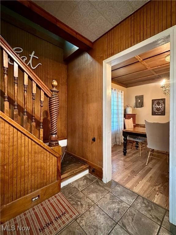 220 N Cleveland Ave, Niles, OH 44446 - entrance foyer featuring wooden walls, stairs, and an ornate ceiling