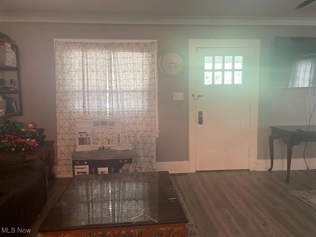 127 William St, Struthers, OH 44471 - foyer featuring wood finished floors and crown molding