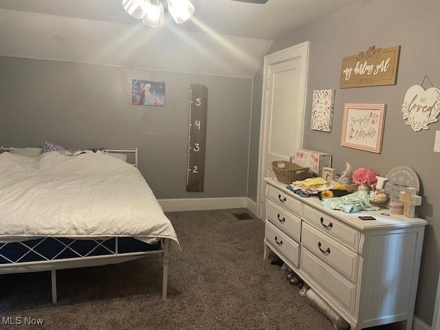 127 William St, Struthers, OH 44471 - carpeted bedroom with vaulted ceiling and baseboards