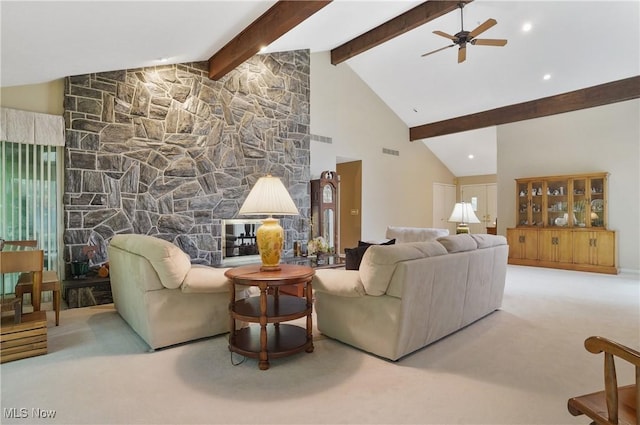 680-7 Windward Dr, Aurora, OH 44202 - carpeted living room featuring beam ceiling, a ceiling fan, and high vaulted ceiling