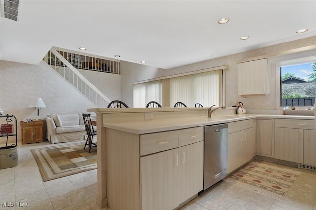 680-7 Windward Dr, Aurora, OH 44202 - kitchen with dishwasher, light brown cabinetry, a peninsula, light tile patterned flooring, and recessed lighting