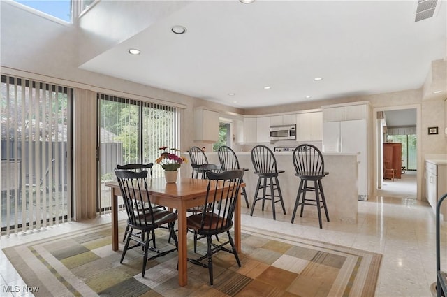 680-7 Windward Dr, Aurora, OH 44202 - dining area featuring light tile patterned flooring and recessed lighting