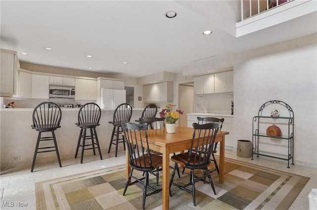 680-7 Windward Dr, Aurora, OH 44202 - dining room featuring recessed lighting and light tile patterned floors