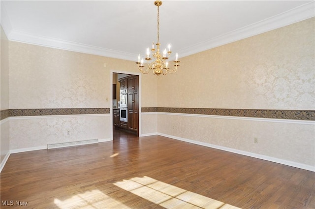 3773 N Shore Dr, Akron, OH 44333 - unfurnished room featuring a chandelier, wallpapered walls, dark wood-style flooring, crown molding, and a wainscoted wall