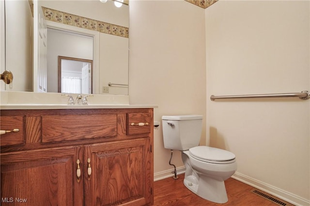 3773 N Shore Dr, Akron, OH 44333 - half bath with wood finished floors and vanity