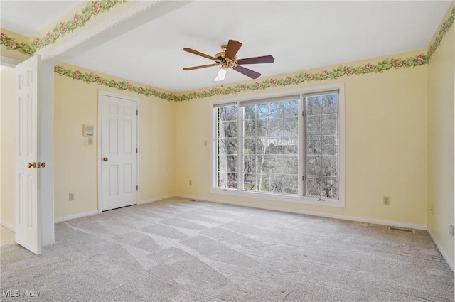 3773 N Shore Dr, Akron, OH 44333 - empty room featuring light carpet and a ceiling fan