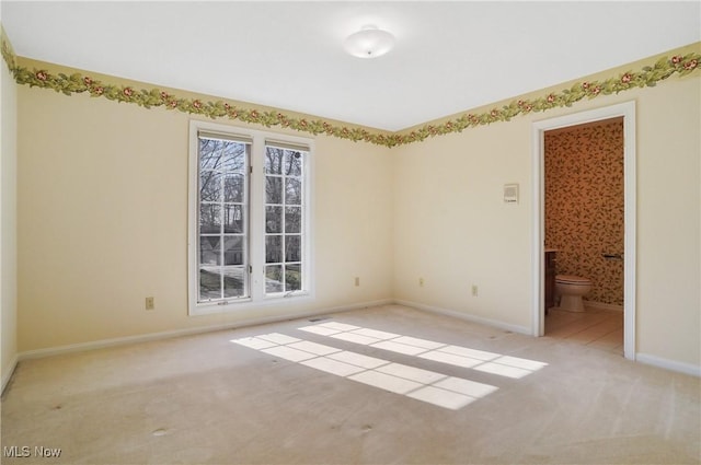 3773 N Shore Dr, Akron, OH 44333 - carpeted spare room featuring baseboards
