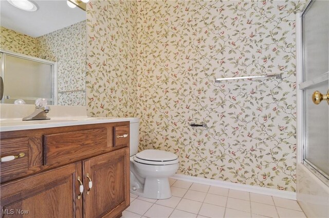 3773 N Shore Dr, Akron, OH 44333 - full bath with wallpapered walls, vanity, a shower with door, and tile patterned flooring