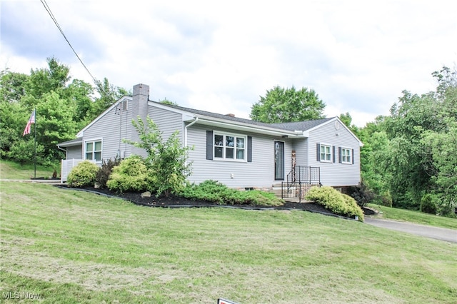 6221 Gault Rd, Canfield, OH 44406 - view of front of house featuring a chimney and a front yard