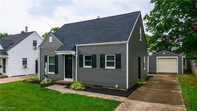 2405 Harding Rd, Cuyahoga Falls, OH 44223 - view of front facade featuring concrete driveway, an outdoor structure, a garage, a front lawn, and a shingled roof