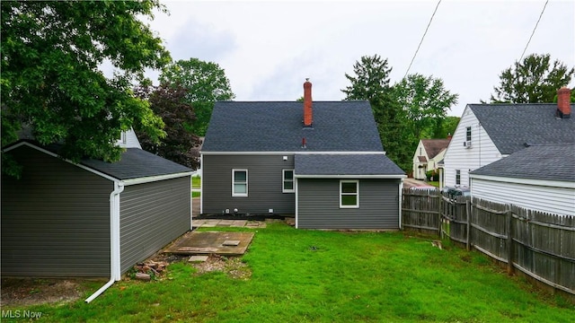 2405 Harding Rd, Cuyahoga Falls, OH 44223 - back of house featuring a chimney