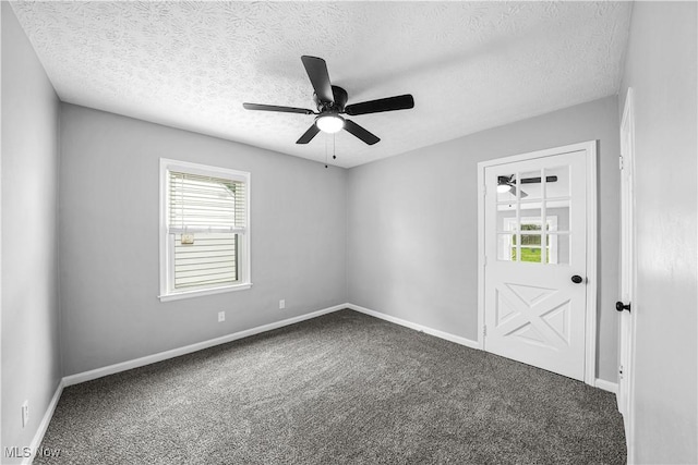 2405 Harding Rd, Cuyahoga Falls, OH 44223 - empty room featuring a ceiling fan, carpet, plenty of natural light, and a textured ceiling