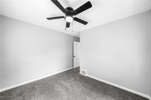2405 Harding Rd, Cuyahoga Falls, OH 44223 - unfurnished room featuring dark colored carpet and a ceiling fan