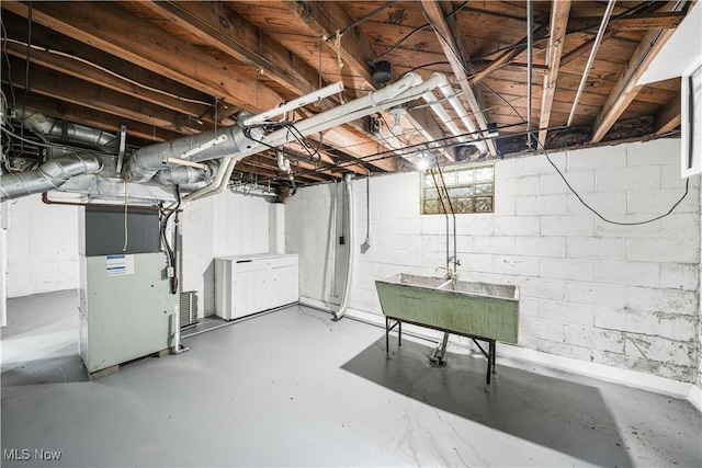 2405 Harding Rd, Cuyahoga Falls, OH 44223 - unfinished basement with a sink and heating unit