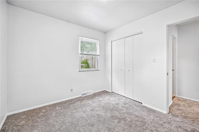 16-18 E Linwood Ave, Akron, OH 44301 - unfurnished bedroom featuring carpet flooring and a closet