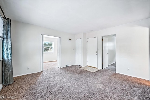 16-18 E Linwood Ave, Akron, OH 44301 - empty room featuring carpet and baseboards