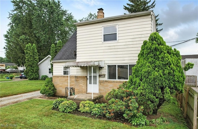 16-18 E Linwood Ave, Akron, OH 44301 - back of property with brick siding and a chimney