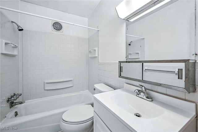 16-18 E Linwood Ave, Akron, OH 44301 - full bath featuring vanity, tub / shower combination, and tile walls