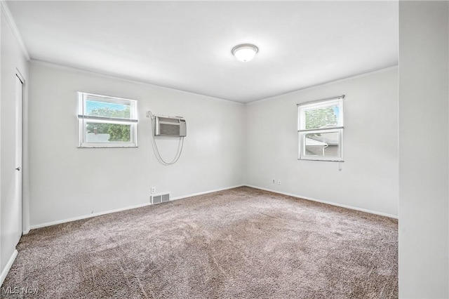 16-18 E Linwood Ave, Akron, OH 44301 - carpeted empty room featuring crown molding and a wall mounted air conditioner