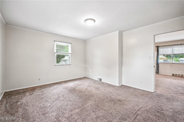 16-18 E Linwood Ave, Akron, OH 44301 - carpeted spare room featuring healthy amount of natural light and ornamental molding