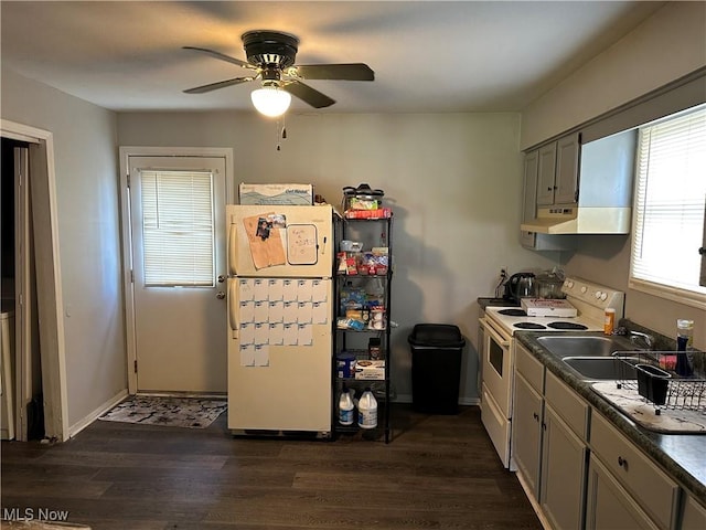 467 Elm St, Struthers, OH 44471 - kitchen with white electric range oven, ventilation hood, a ceiling fan, dark wood finished floors, and dark countertops