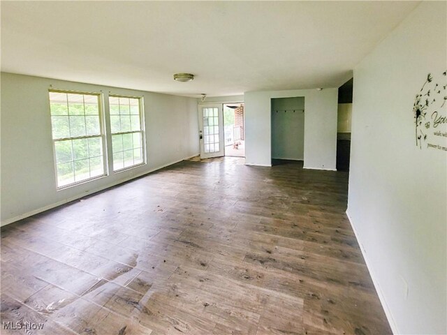 56612 Mcgee Rd, Shadyside, OH 43947 - spare room with wood finished floors and baseboards