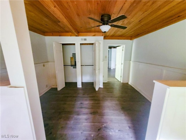 56612 Mcgee Rd, Shadyside, OH 43947 - unfurnished bedroom with wood ceiling, multiple closets, and dark wood-style floors