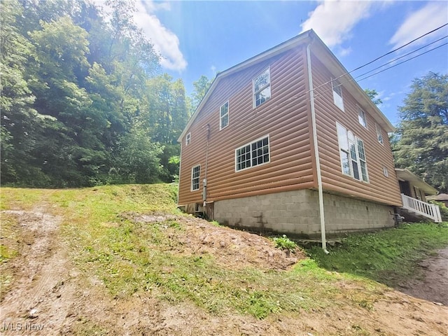 56612 Mcgee Rd, Shadyside, OH 43947 - view of property exterior featuring log veneer siding