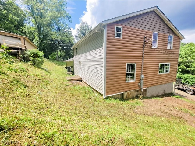 56612 Mcgee Rd, Shadyside, OH 43947 - view of property exterior featuring a lawn