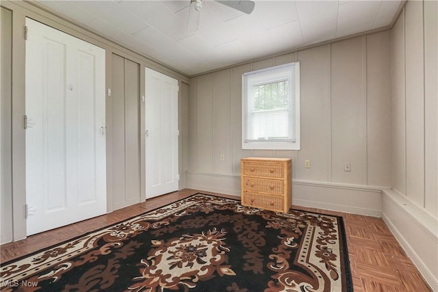 4465 Oberlin Ave, Lorain, OH 44053 - unfurnished bedroom featuring a decorative wall and ceiling fan