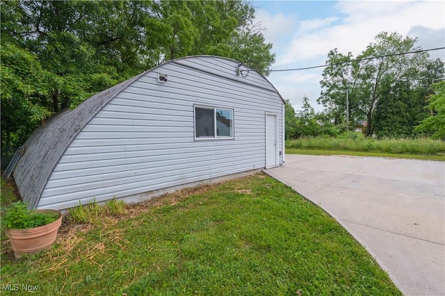4465 Oberlin Ave, Lorain, OH 44053 - view of property exterior featuring a lawn